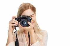 微笑工作室拍摄年轻的女摄影师采取图片孤立的白色