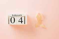 粉红色的意识丝带标志轧光机2月世界癌症一天运动