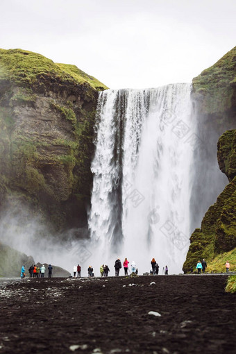 旅游吸引力斯科加瀑布瀑布垂直拍摄瀑布游客