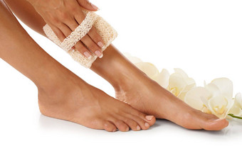擦洗修脚女人脚工作室水疗中心奢侈品护肤品花产品广告皮肤护理美自然花化妆品脚孤立的白色背景市场营销