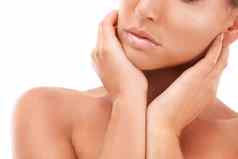 化妆美皮肤女人手口孤立的白色背景护肤品年轻的模型工作室发光面部皮肤水疗中心治疗身体健康化妆品