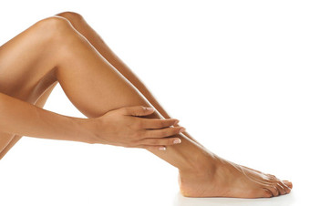 皮肤腿女人工作室美健康梳理白色背景护肤品腿模型感觉完美的光滑的发光的满意度奢侈品例程身体护理