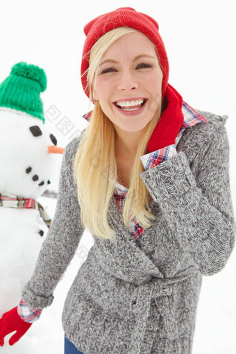 冬天雪肖像女人雪人享受假期假期周末冷天气幸福放松女孩微笑装饰冰数字有趣的自然圣诞节