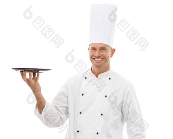 老板持有托盘自信肖像微笑展示促销餐厅产品放置孤立的白色背景快乐执行烹饪男人。统一的模拟菜单发射工作室