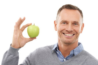 男人。工作室肖像苹果手健康饮食健康孤立的白色背景模型人<strong>营养素</strong>食主义者水果食物健康的生活方式动机清洁吃