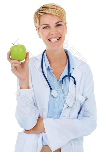 开年轻的微笑医生持有绿色苹果
