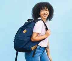 肖像学生黑色的女人背包蓝色的背景研究快乐脸女孩年轻的人袋大学教育奖学金机会学习大学