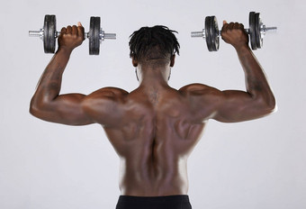 健身锻炼培训强大的黑色的男人。哑铃工作室身体回来健美运动员人锻炼火车权重权力健康健康增长动机