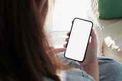 模拟电话女人手显示白色屏幕移动电话白色屏幕空白背景模糊
