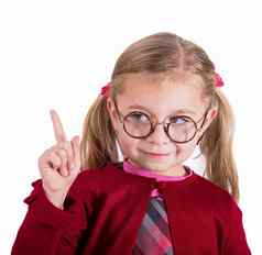 特写镜头肖像女孩穿眼镜概念眼睛疾病教育好奇的孩子美丽的女孩古董眼镜眼睛扩大