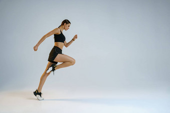 运动确定女人运行有氧运动锻炼工作室背景