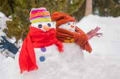 夫妇雪人帽子围巾冬天有趣的