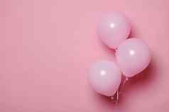 粉红色的柔和的充气空气球氦气球孤立的粉红色的颜色背景免费的广告空间