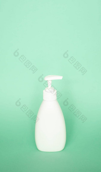 白色塑料肥皂自动售货机泵瓶柔和的绿色背景皮肤<strong>护</strong>理<strong>乳液</strong>洗发水瓶浴身体<strong>乳液</strong>浴室配件