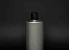 灰色液体容器过来这里乳液奶油洗发水浴泡沫化妆品塑料瓶黑色的背景化妆品包装模型复制空间