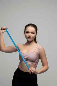 快乐苗条的浅黑肤色的女人女人体育运动穿测量磁带白色背景积极的重量损失饮食结果健康的生活方式概念