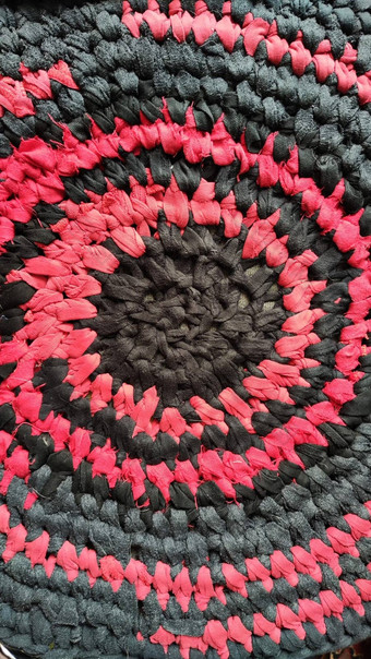 针织黑色的红色的纹理背景乡村农村传统的轮地毯