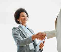 业务女商人握手女人手办公室会议团队合作协议成功