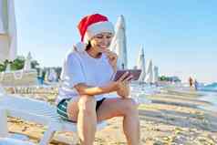 一年圣诞节假期快乐女人圣诞老人他海滩使视频调用