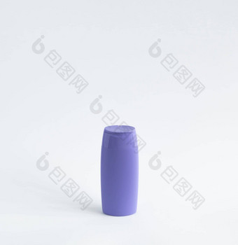 紫罗兰色的<strong>塑料瓶</strong>身体护理美产品工作室摄影<strong>塑料瓶</strong>洗发水淋浴过来这里噪音孤立的白色背景