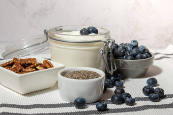 玻璃Jar自然有机自制的酸奶蓝莓山核桃螺母<strong>传</strong>讲种子布丁提高免疫力成分概念健康的吃早餐希腊酸奶发酵超级食物