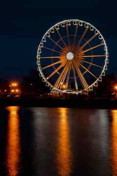 格但斯克波兰摩天轮小镇格但斯克晚上晚上黄昏反射河水欧洲长曝光照片城市风景优美的视图照亮吸引力公园街