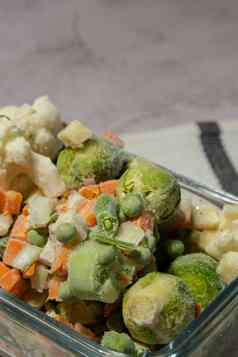 冻混合蔬菜长期存储深冻结蔬菜除霜冻食物背景