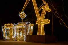 建设起重机象征船厂假期照亮装饰格但斯克波兰美丽的圣诞节公平晚上出现冬天时间欧洲背景圣诞节市场12月