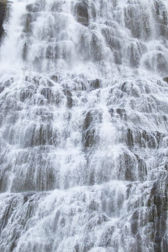 瀑布水纹理美丽的纯自然冰岛强大的山河背景