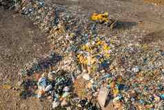 挖掘机收集垃圾垃圾填埋场回收生态灾难