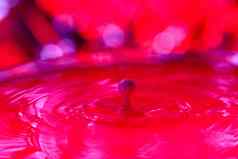 下降瀑布密集的液体红色的背景摘要色彩斑斓的背景