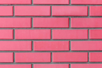 光深红色的红色的粉红色的颜色砖块墙纹理背景砖砌的