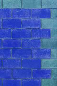 蓝色的光蓝色的油漆砖块城市颜色设计墙纹理背景体系结构