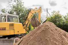 液压活塞系统挖掘机桶卸载大桩土地工业网站挖掘建设工作