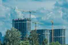 塔起重机构建发展城市房子体系结构行业蓝色的天空背景