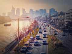 忙交通高速公路城市街道创建高污染烟雾城市日落视图他的河国防大都会区巴黎法国