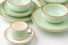 集白色柔和的绿色陶瓷餐具橙色概述了