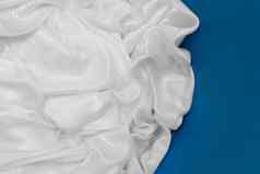 白色织物材料纺织古董桌布棉花模式纹理蓝色的背景