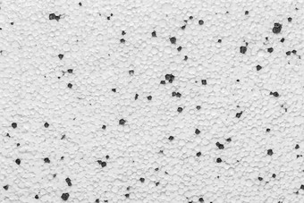 聚苯乙烯泡沫塑料聚苯乙烯石膏板干墙泡沫建筑材料表面白色摘要黑色的模式点墙纹理背景