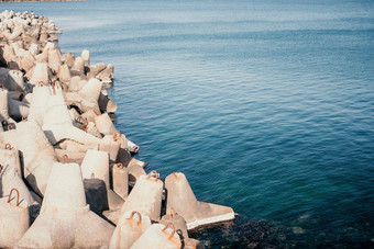 海岸防波堤保护大波海水背景海滨钢筋混凝土四足动物