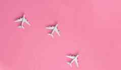 飞机旅行目的地粉红色的背景空间文本