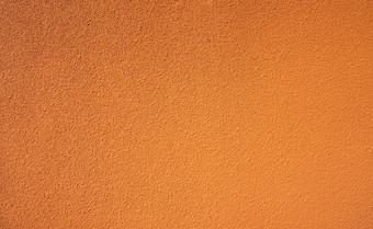 橙色粗糙的混凝土墙纹理背景空橙色混凝土墙摘要背景完整的框架橙色水泥墙纹理背景空白粮食粉刷墙橙色混凝土材料