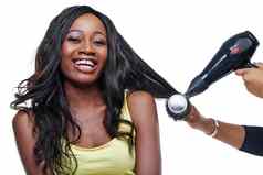 肖像微笑黑色的女人头发护理工具梳理女孩孤立的白色工作室背景脸女人女孩化妆品设备治疗体积