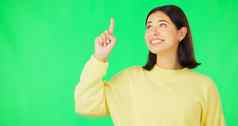 肖像点品牌女人绿色屏幕背景工作室市场营销产品放置手手势广告选项有吸引力的年轻的女色度
