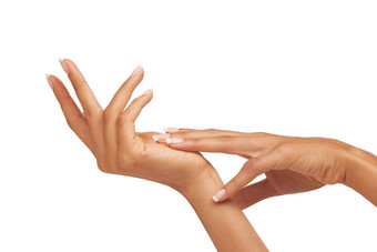 光滑的滋润触碰手护肤品孤立的白色背景工作室软发光女人感觉手修指甲美治疗健康皮肤