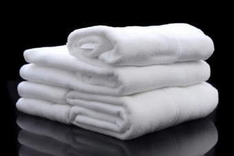 白色毛巾布草布料居家洗护用品酒店宾馆旅店商务住宿洗手间摄影图