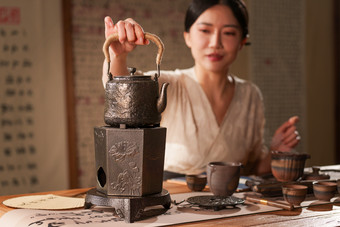 茶道青年女人围炉煮茶桌子相片