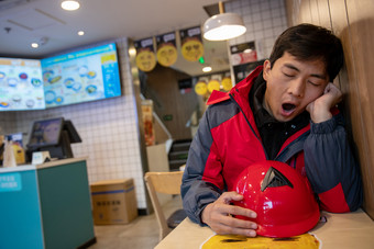 在休息快递员休息递送人员饮食行业摄影图