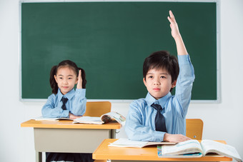 小学生举手成长校服学龄儿童照片