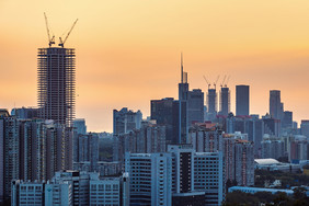 夕阳城市建筑剪影摄影图片